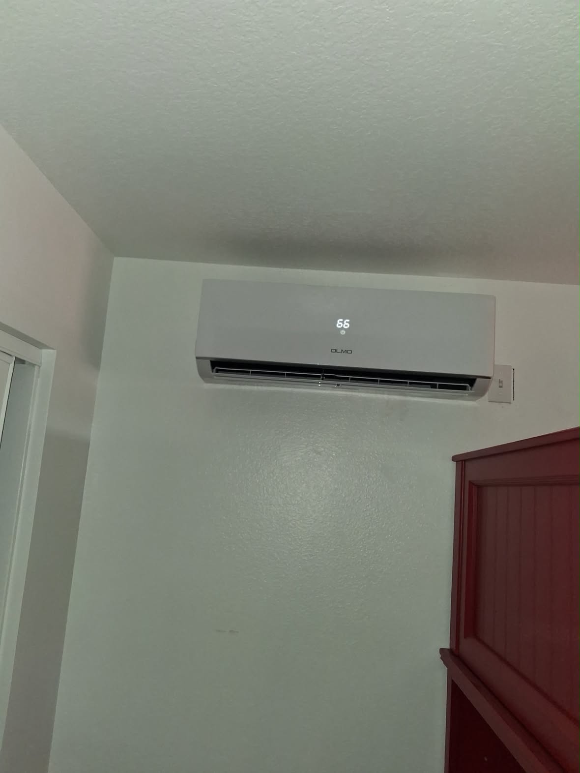 Olmo ductless mini-split head reading 66 degrees