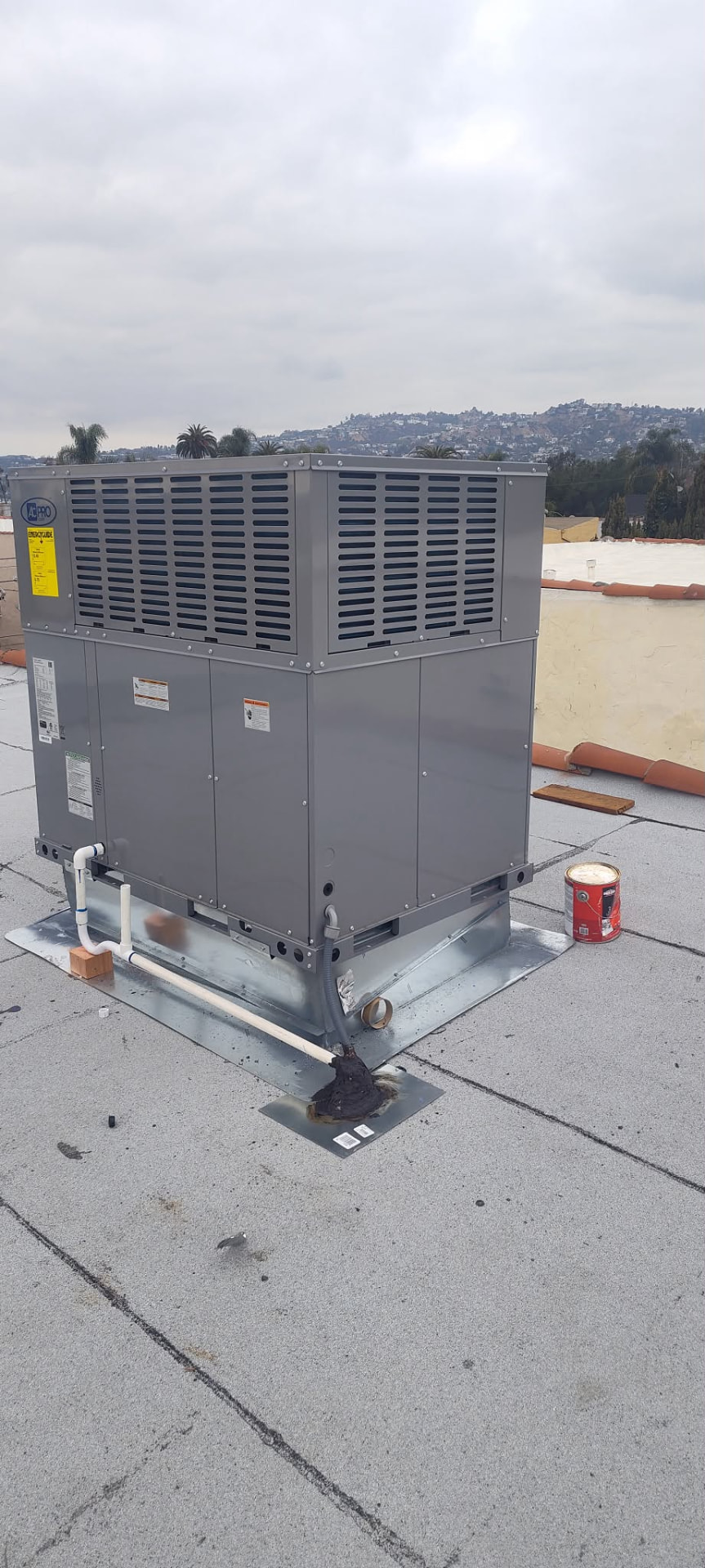 AC Pro rooftop package unit installed on a Los Angeles flat roof